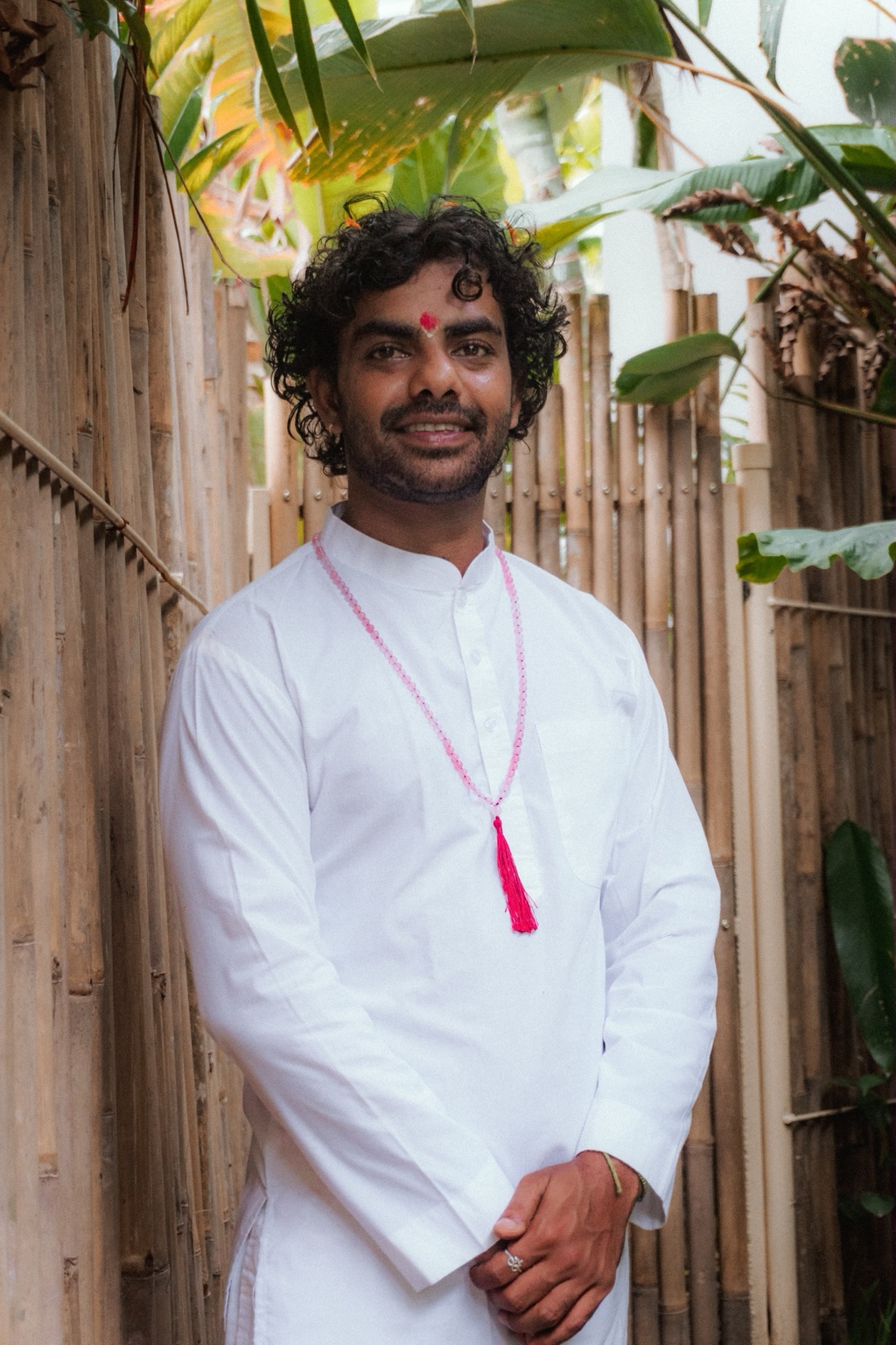 Navin portrait in natural bamboo garden setting